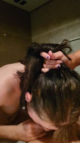 One girl helping another suck on a thick cock : video clip