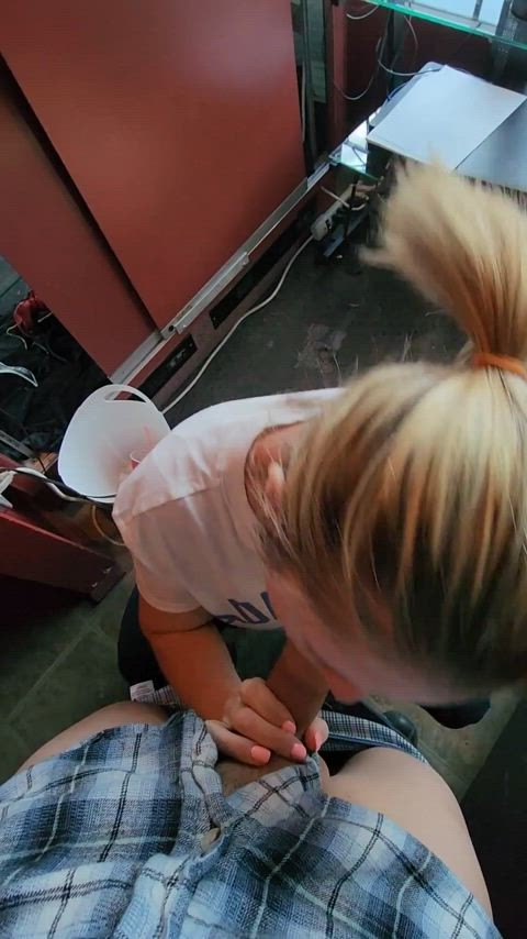 Sucking cock behind the counter at work : video clip