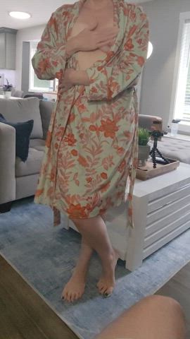 Tease and drop the robe to get it started, then suck him off when he's hard. : video clip