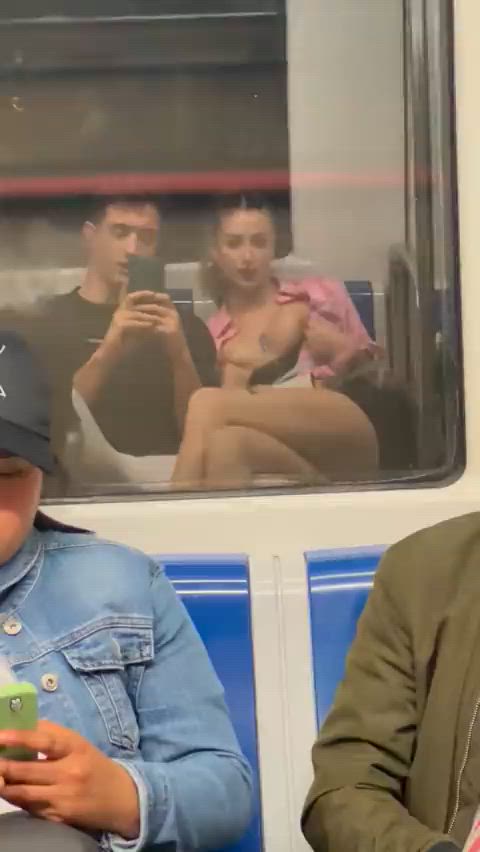 Showing tits on the public train : video clip