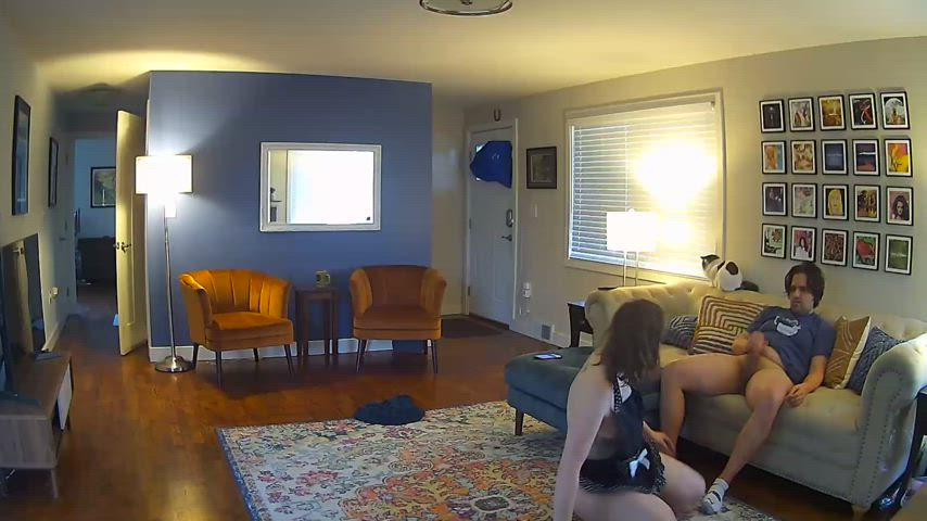 Surprised him with this maid apron outfit and gave him a blowjob on the couch : video clip