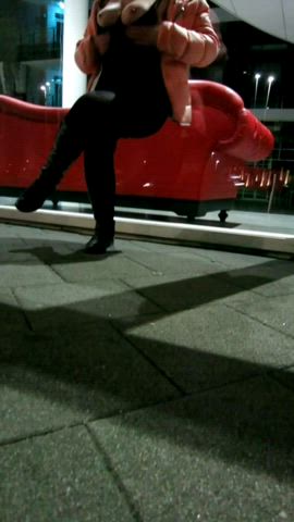 Next to the highway in front of an office building. : video clip