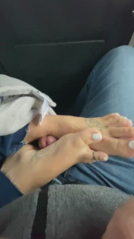 Sneaky footjob in the back of a packed van on our road trip! : video clip