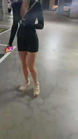 Showing boobs in a parking garage : video clip