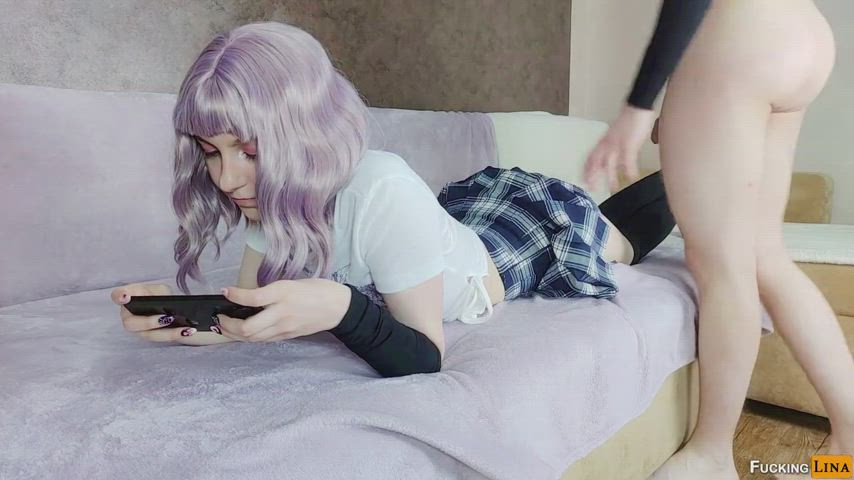 She's trying to play phone games : video clip