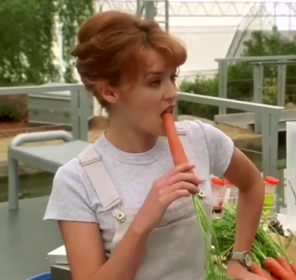 Kylie Minogue and a lucky carrot in "Bio-Dome" (1996) : video clip