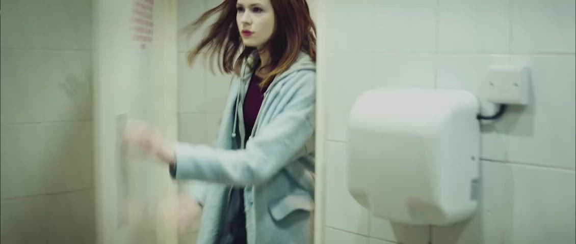 Karen Gillan feels horny and enters the men's restroom for quick sex : video clip
