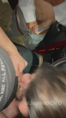 Sucking my husband's cock at a sex shop parking lot while strangers gathered around and jacked off : video clip