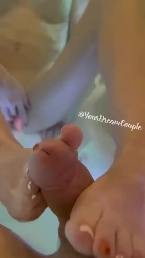 Playing footsie in the hot tub : video clip
