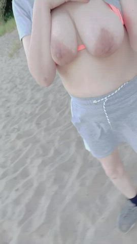 Here I am topless running in the sand at the beach : video clip