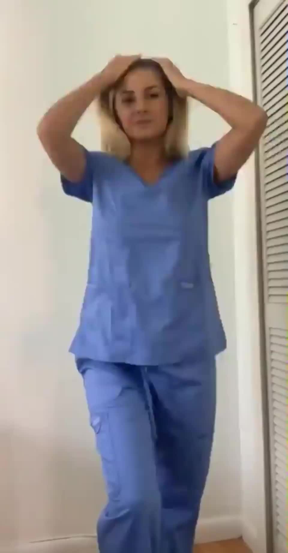 Beautiful blonde nurse strips off her clothes and bends over : video clip