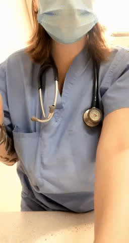 Nurse showing boobs at work : video clip