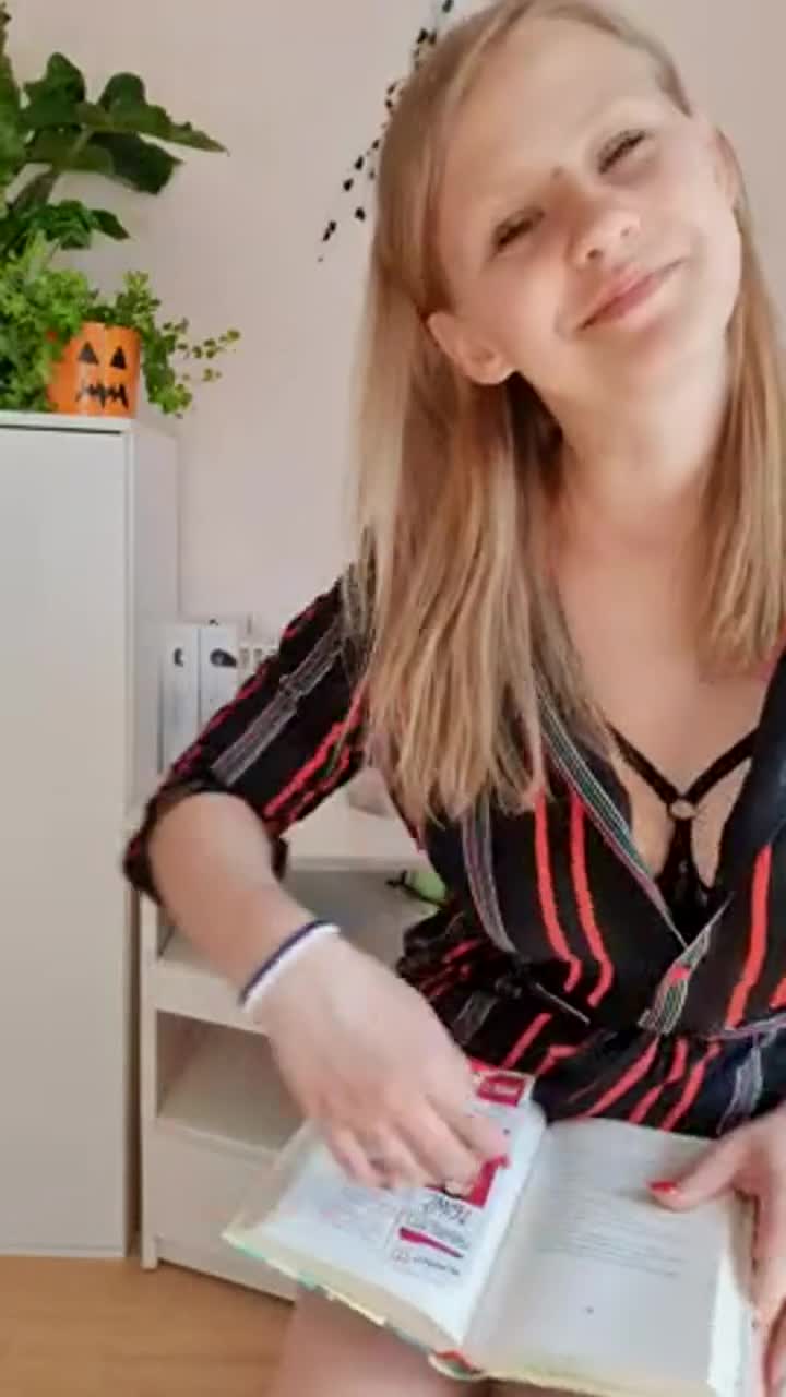 And today I, the nerdy girl, will show you my huge boobs, and in the background my modest two libraries. The second one is a magical library. Heh : video clip