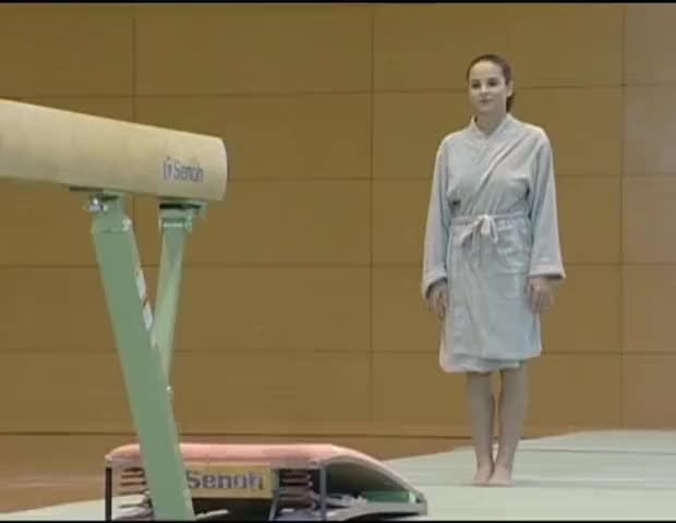 Corina Ungureanu. Topless gymnastics. 2002 : video clip