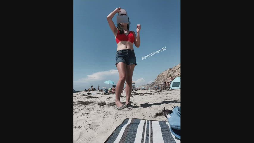 Stripping naked at a public beach [gif] : video clip