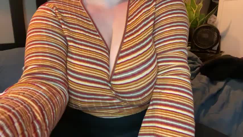 Wanna see what I have hiding under my shirt? : video clip