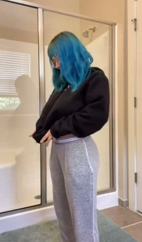 Blue haired girl showing off : video clip