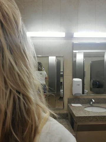 Showing my off my butt plug in a public restroom. [gif] : video clip