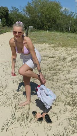 Just a couple of breast friends at the beach : video clip