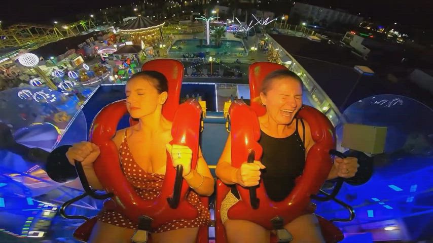Wind blowing off dresses on slingshot ride : video clip