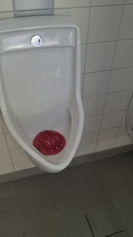 Fucking girlfriend's throat at the urinals : video clip