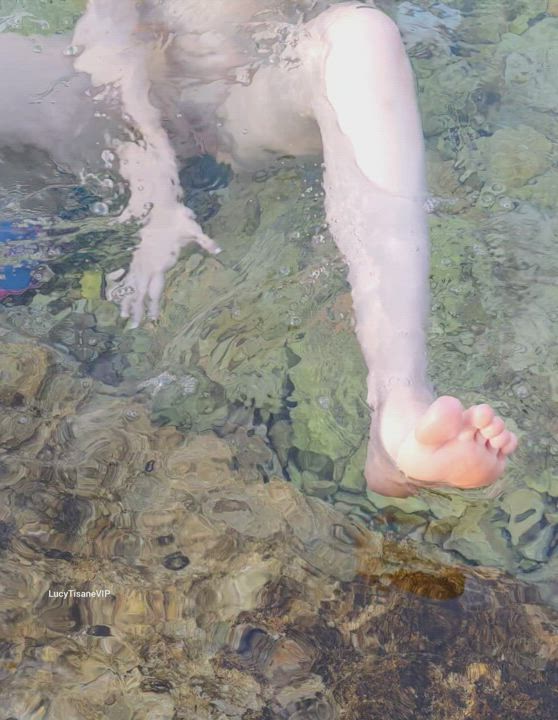 Some underwater fun on a public beach. : video clip