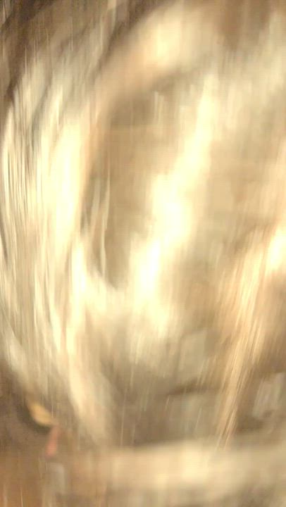 Stroking the shaft and cradling the balls : video clip