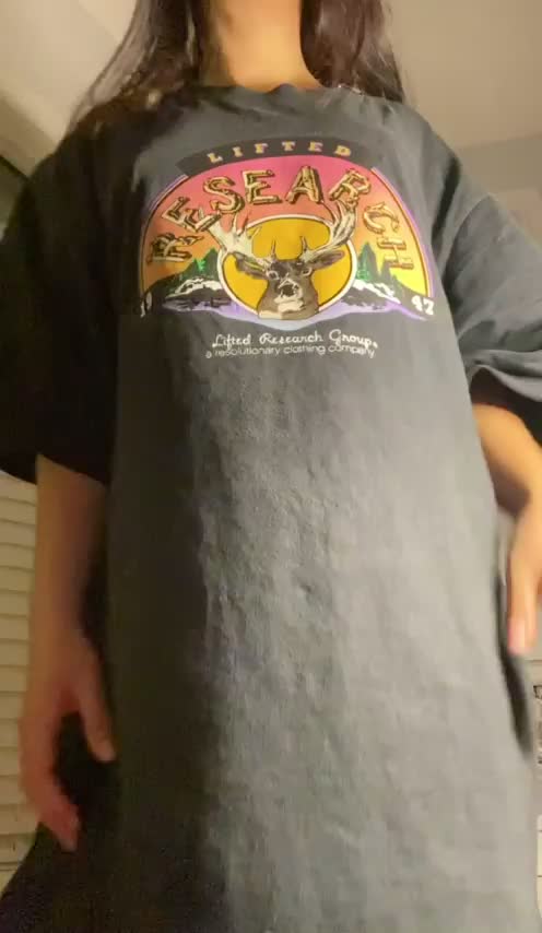 Tiny teen hiding under a big T : video clip