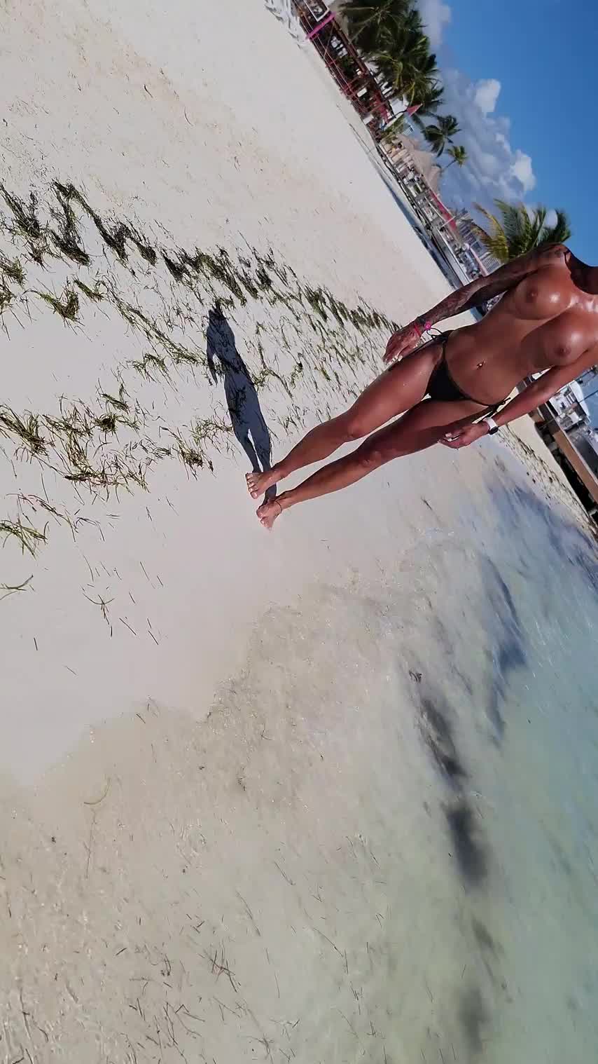 Just out walking the beach working on that perfect tan : video clip