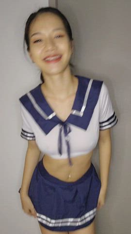Dancing in schoolgirl costume : video clip