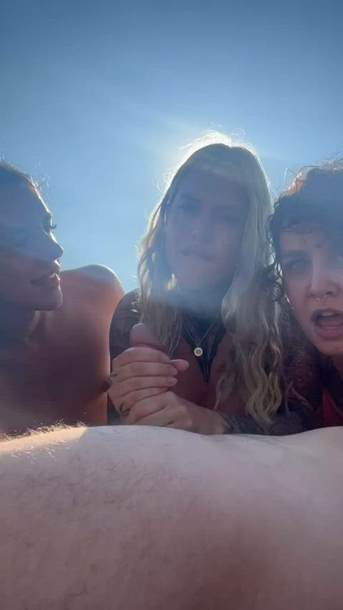 Guy getting his dicked sucked by 3 girls on the beach. : video clip