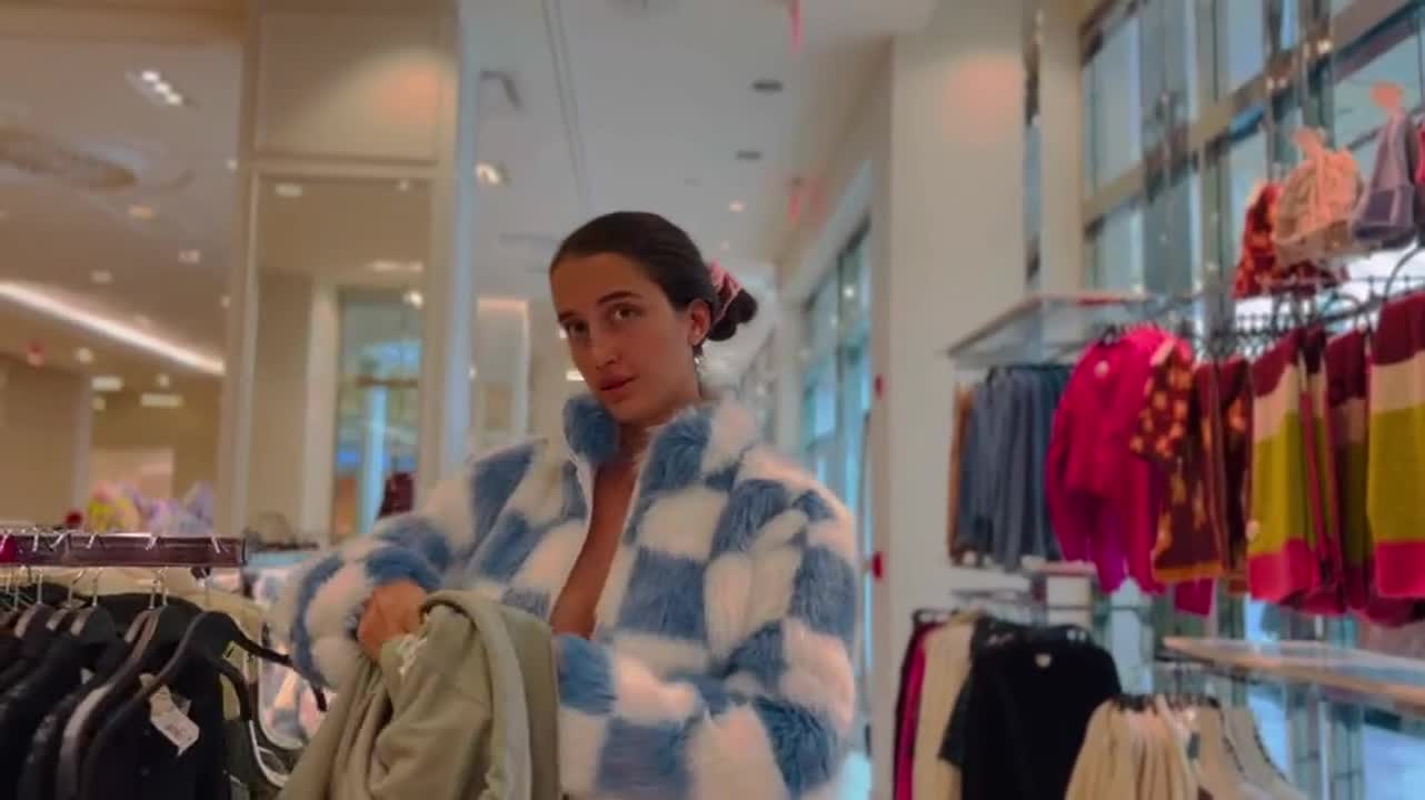 Without a bra in the store [gif] : video clip