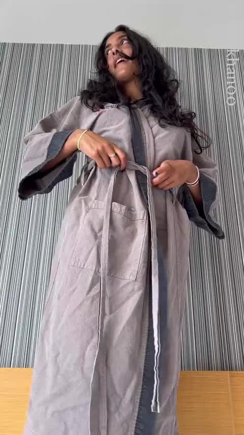 Wait to see what’s under the dressing gown/robe/housecoat : video clip