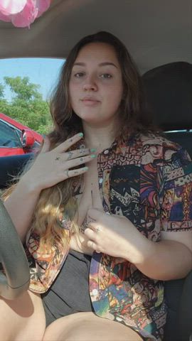 flashing my big tits in the parking lot : video clip