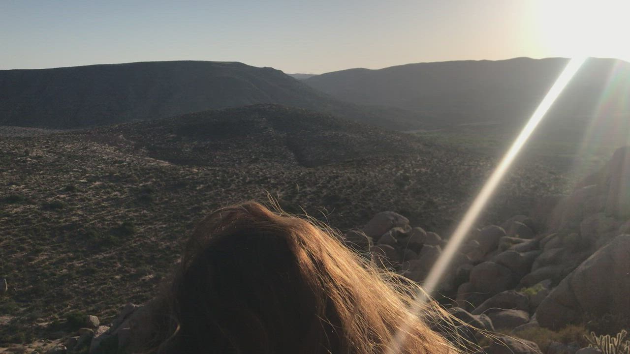 Bent over a rock in the desert. Do you like my hiking outfit? [gif] : video clip