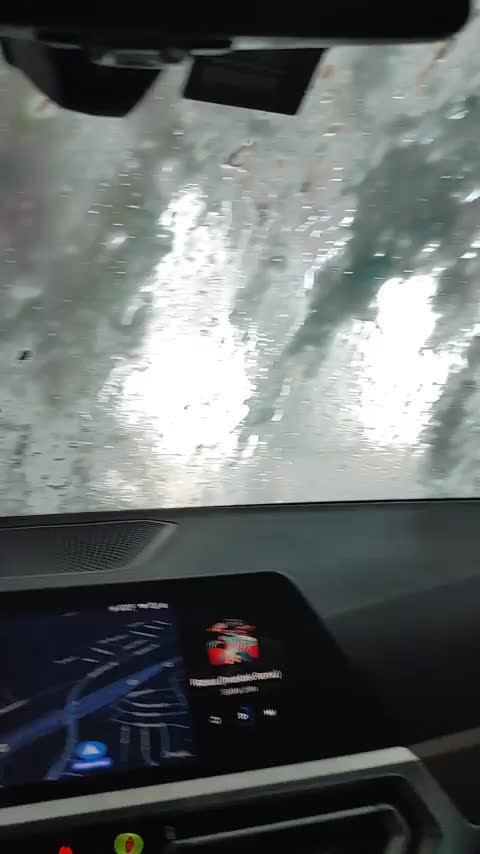 Car washes titties! : video clip