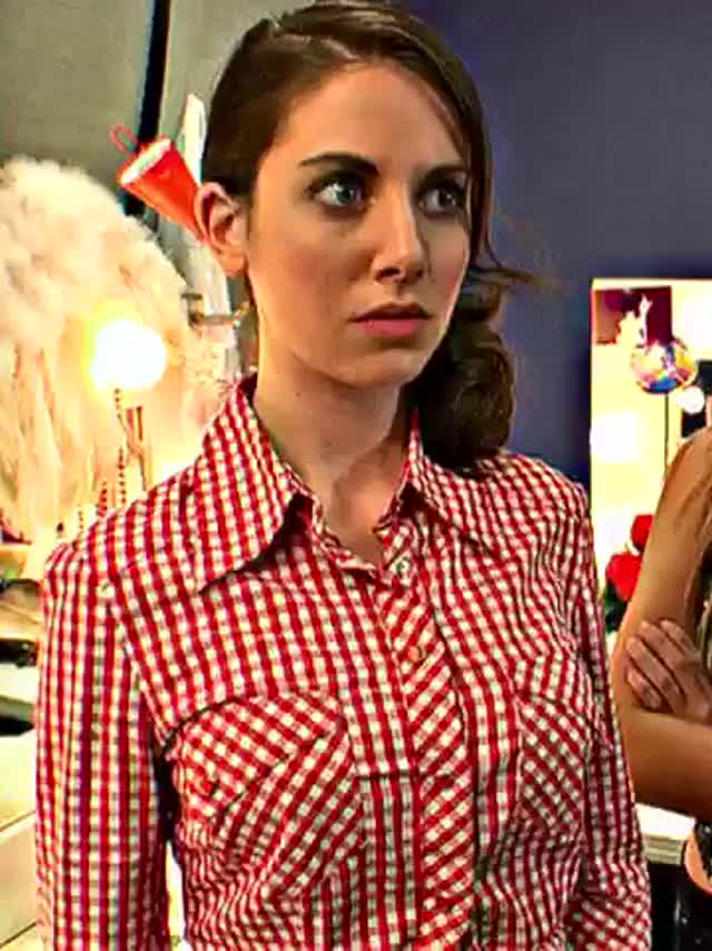 Alison Brie's shirt ripped open to show off her ample cleavage : video clip