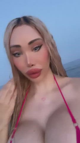 Plastic doll at the beach : video clip