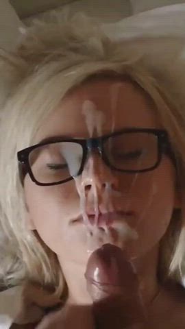 blonde girl with glasses facial : video clip