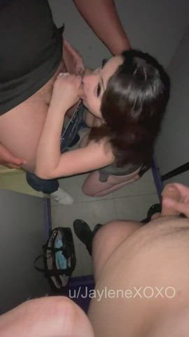 Sucking a stranger's cock at the glory hole sex arcade while my husband watches : video clip
