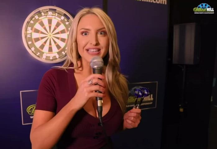Big titty bimbo learns how to play darts : video clip